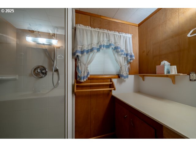628 13th Street Lyons, OR 97358 - Photo 18 of 32 a bathroom with a bathtub and shower