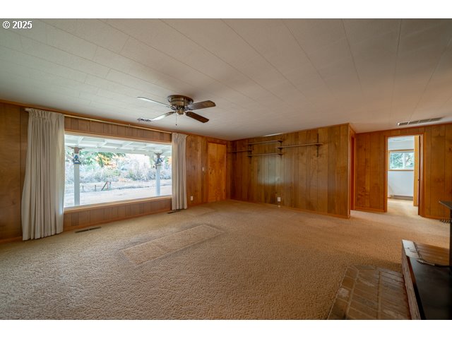 628 13th Street Lyons, OR 97358 - Photo 6 of 32 a view of an empty room with a window