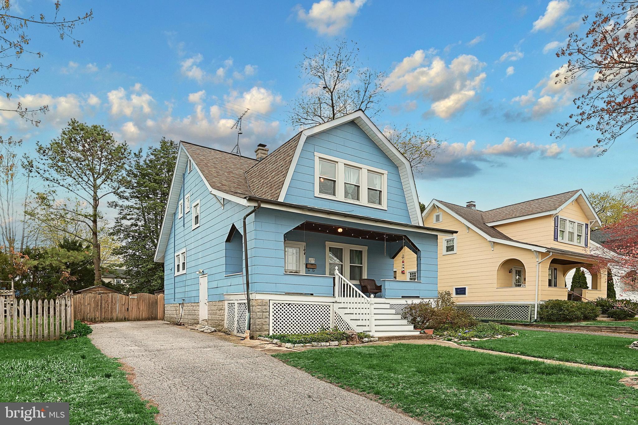 615 Dunkirk Road Baltimore, MD 21212 - Photo 2 of 45 a front view of a house with a yard and garage