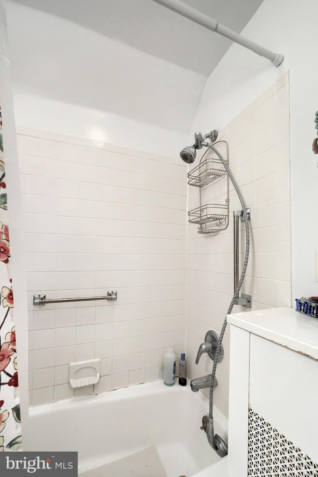 615 Dunkirk Road Baltimore, MD 21212 - Photo 25 of 45 a bathroom with a sink and a mirror