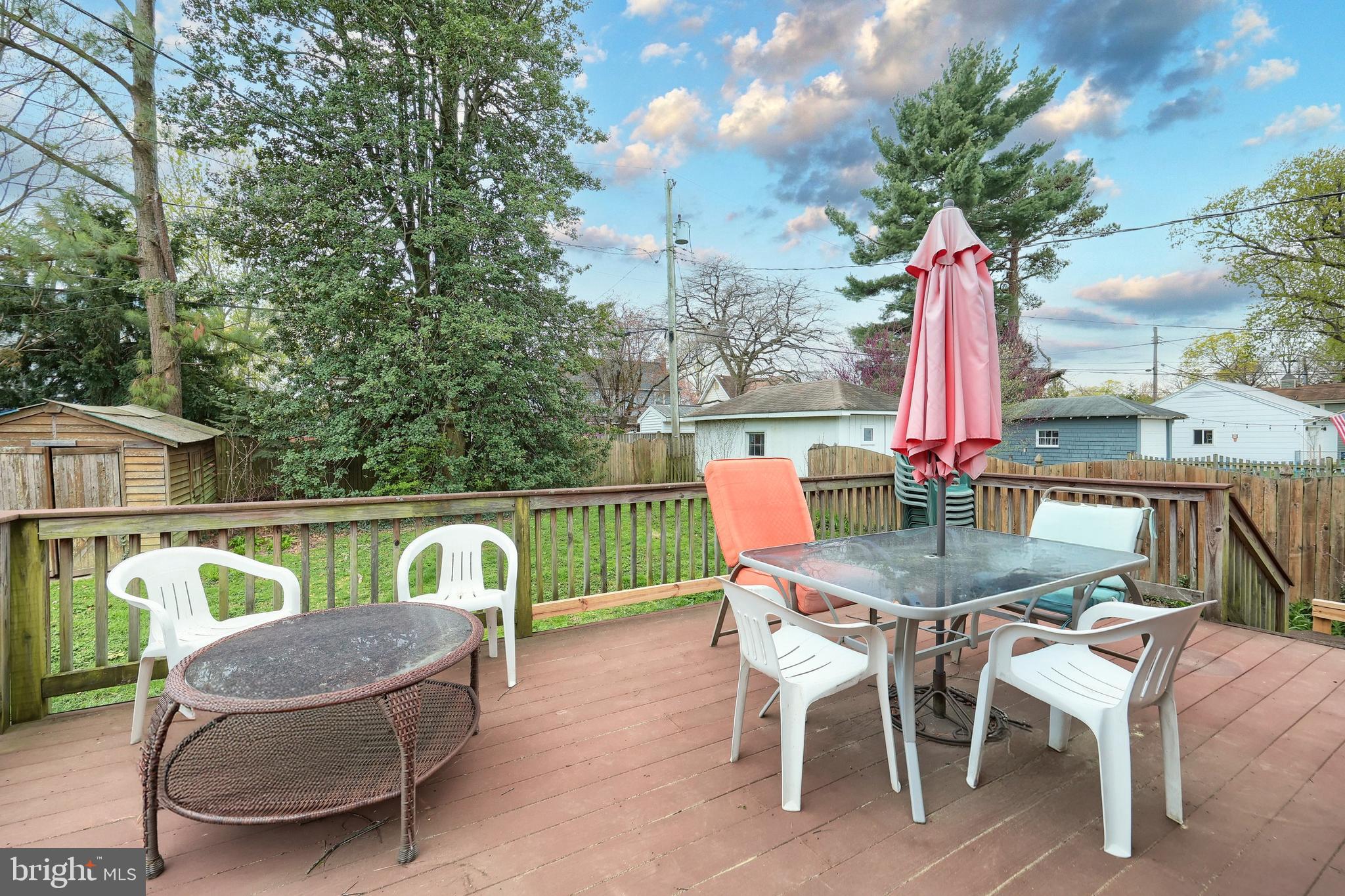 615 Dunkirk Road Baltimore, MD 21212 - Photo 30 of 45 a view of deck with furniture and a table and chairs