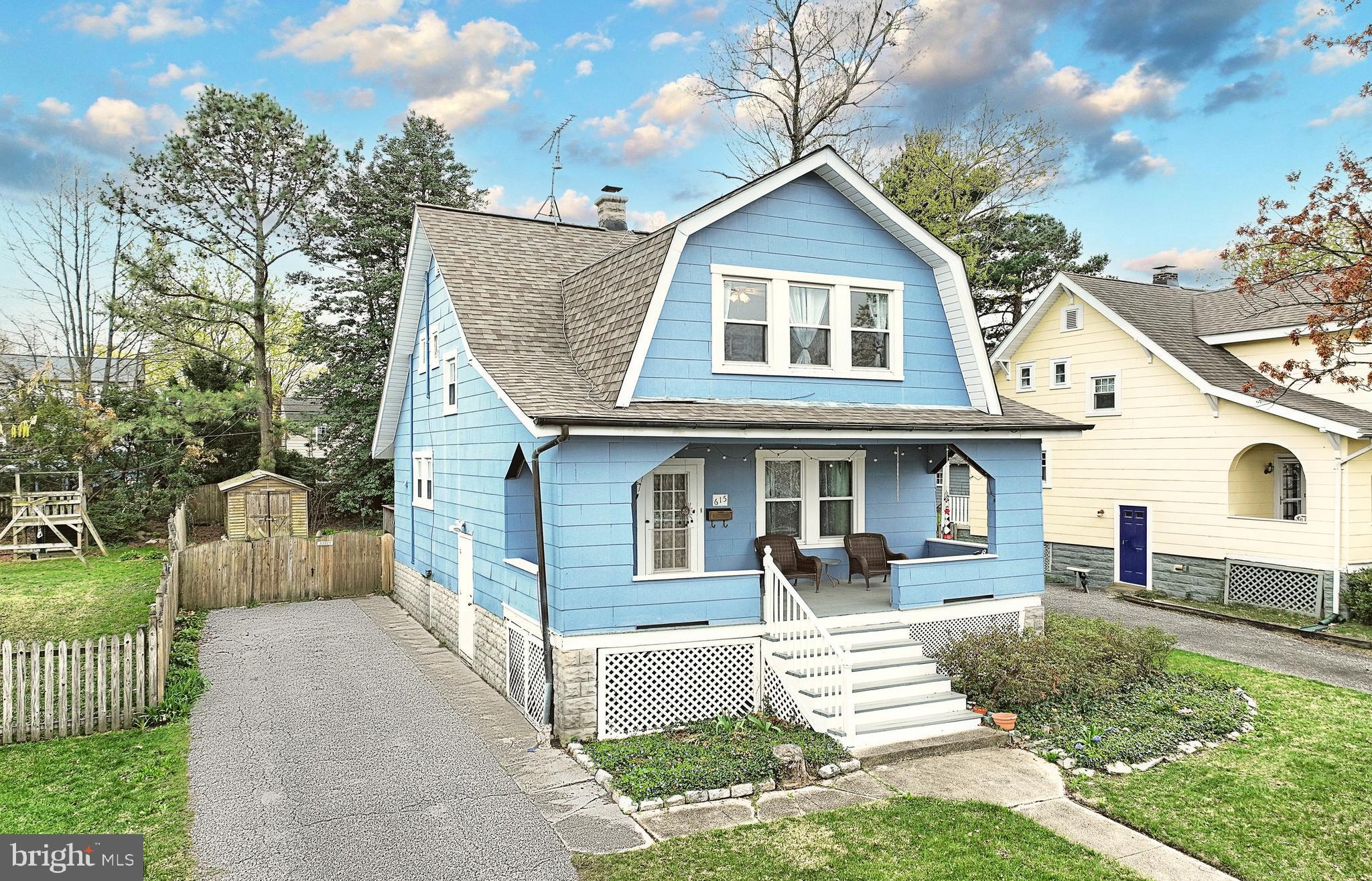 615 Dunkirk Road Baltimore, MD 21212 - Photo 5 of 45 a front view of a house with a yard