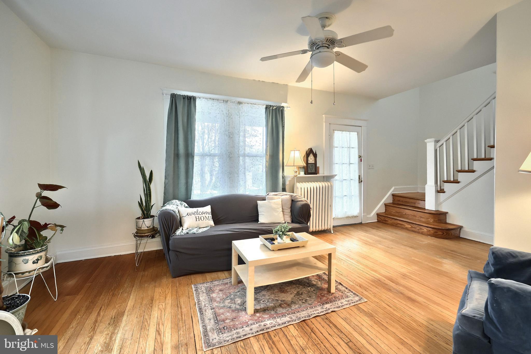 615 Dunkirk Road Baltimore, MD 21212 - Photo 10 of 45 a living room with furniture and a wooden floor