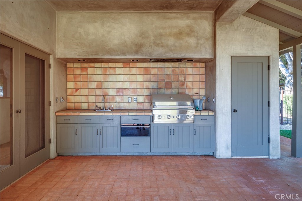 3595 West Oak Trail Road Santa Ynez, CA 93460 - Photo 41 of 60 a view of kitchen with granite countertop cabinets