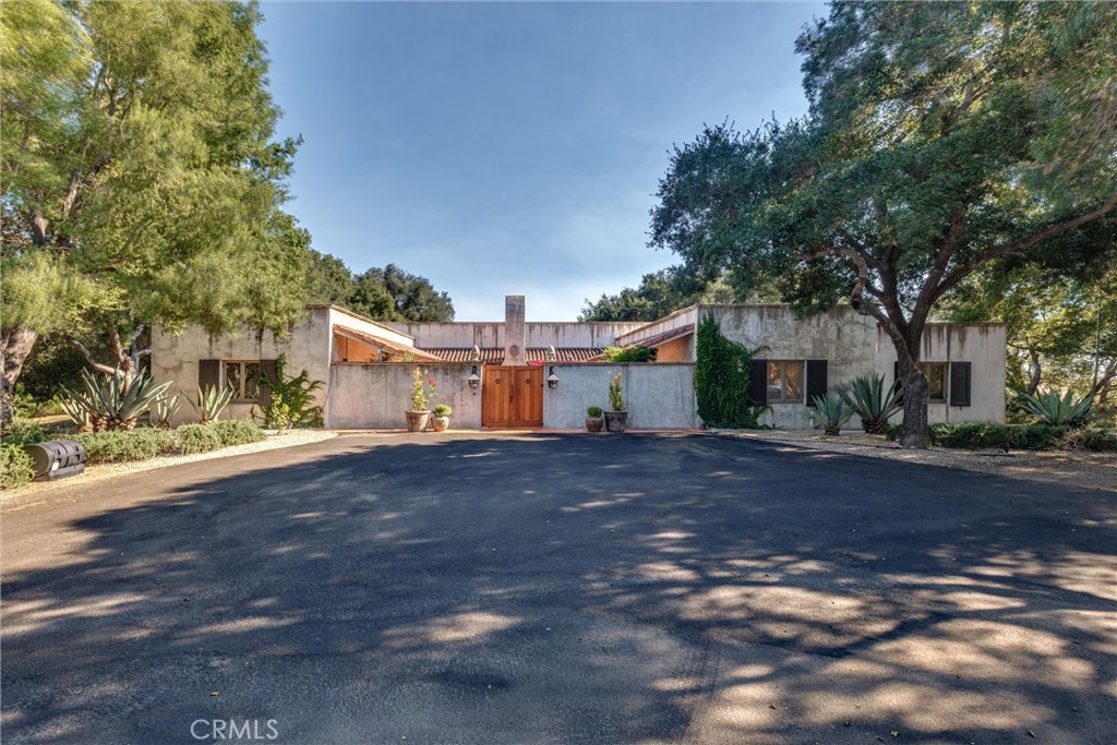 3595 West Oak Trail Road Santa Ynez, CA 93460 - Photo 5 of 60 a view of a house with a yard and garage