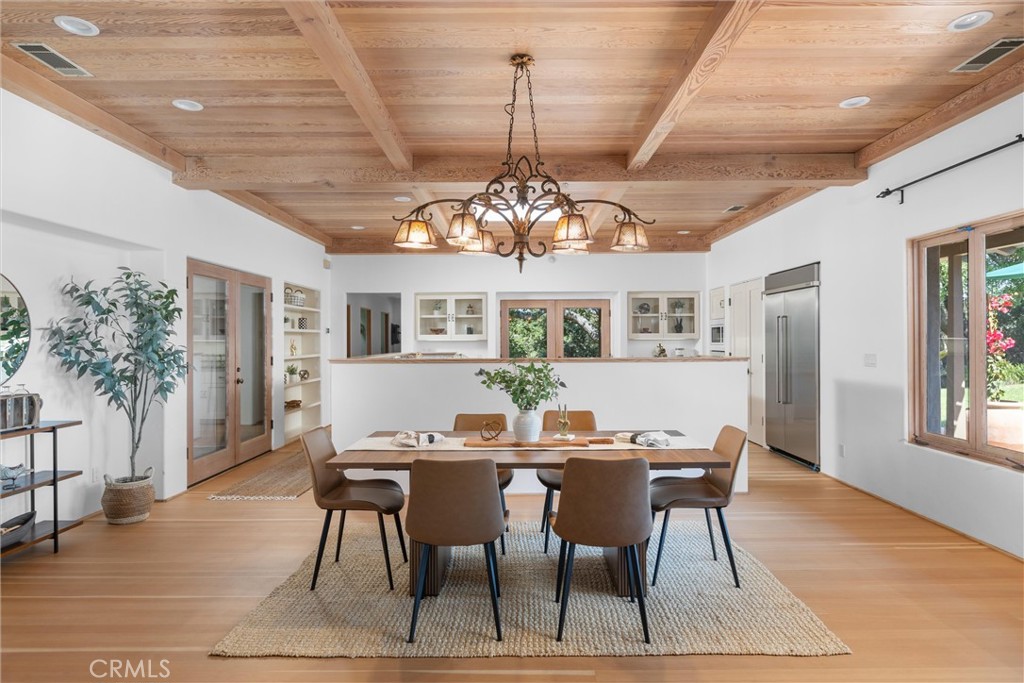 3595 West Oak Trail Road Santa Ynez, CA 93460 - Photo 9 of 60 a view of a dining room with furniture window and wooden floor