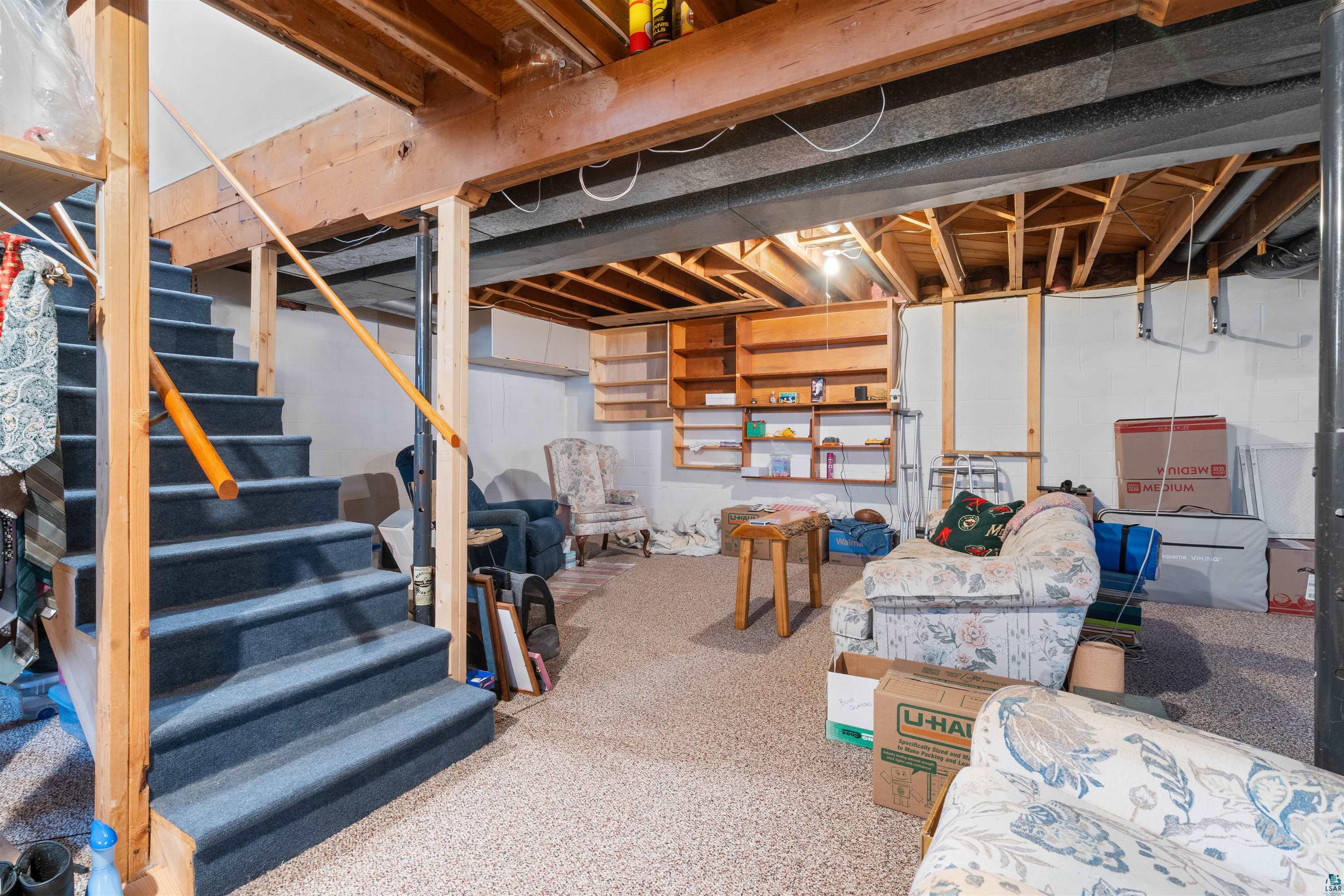 1580 Olsonville Road Carlton, MN 55718 - Photo 14 of 30 Unfinished below grade area featuring stairs