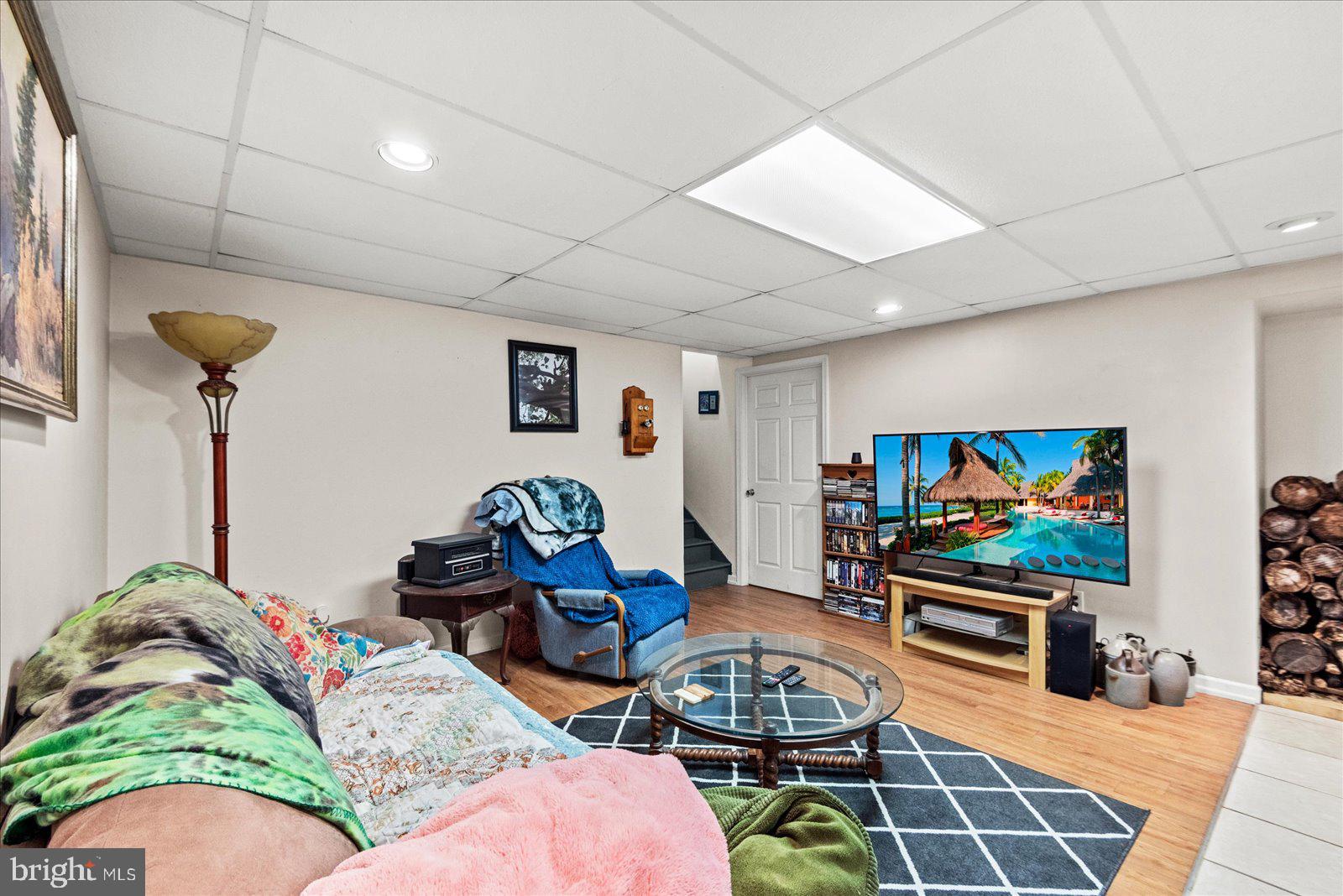 804 Buggy Lane Rochelle, VA 22738 - Photo 27 of 50 a living room with furniture and a flat screen tv