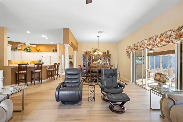 a bathroom with a sink vanity mirror and toilet