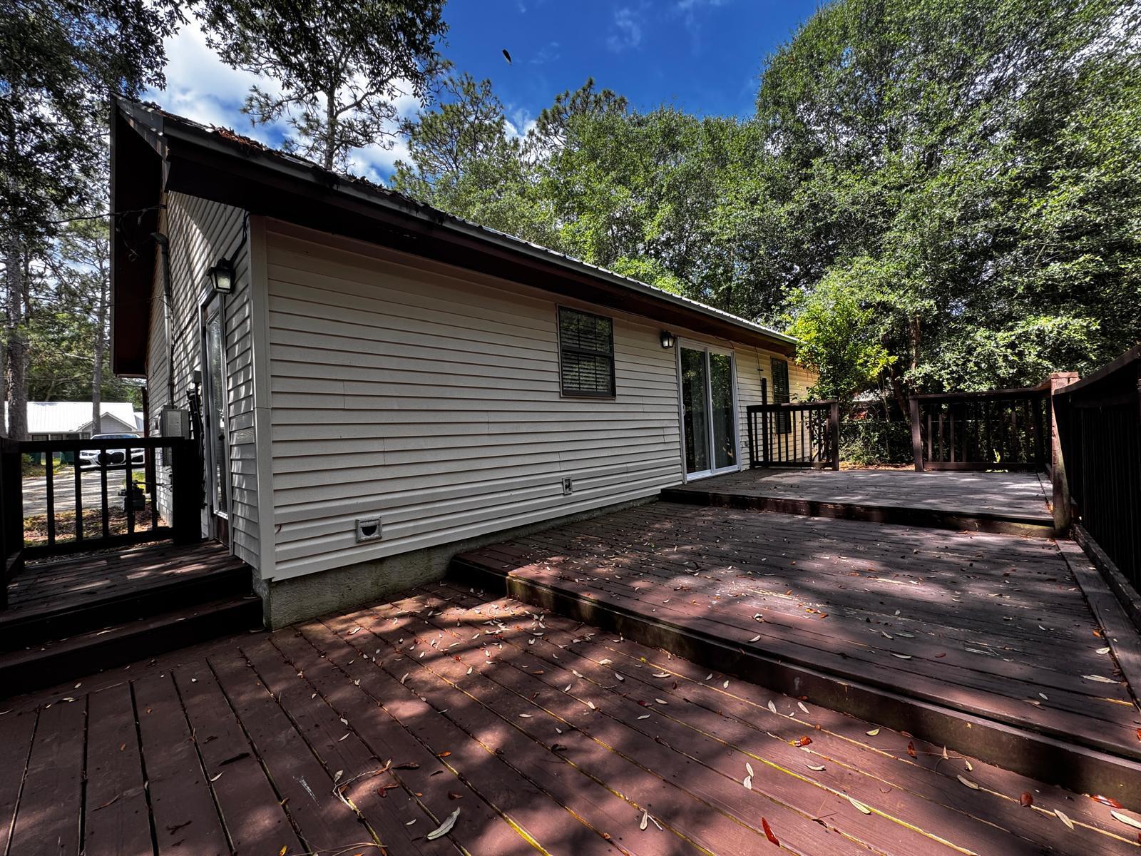 358 John King Road Crestview, FL 32539 - Photo 20 of 22 a backyard of a house