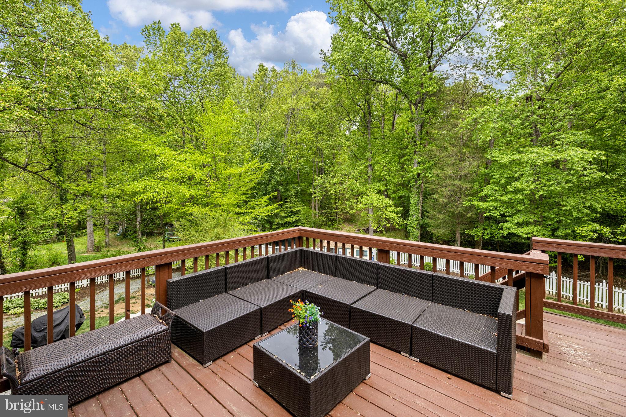 100 Boscobel Road Fredericksburg, VA 22405 - Photo 27 of 67 a view of a wooden deck with a bench