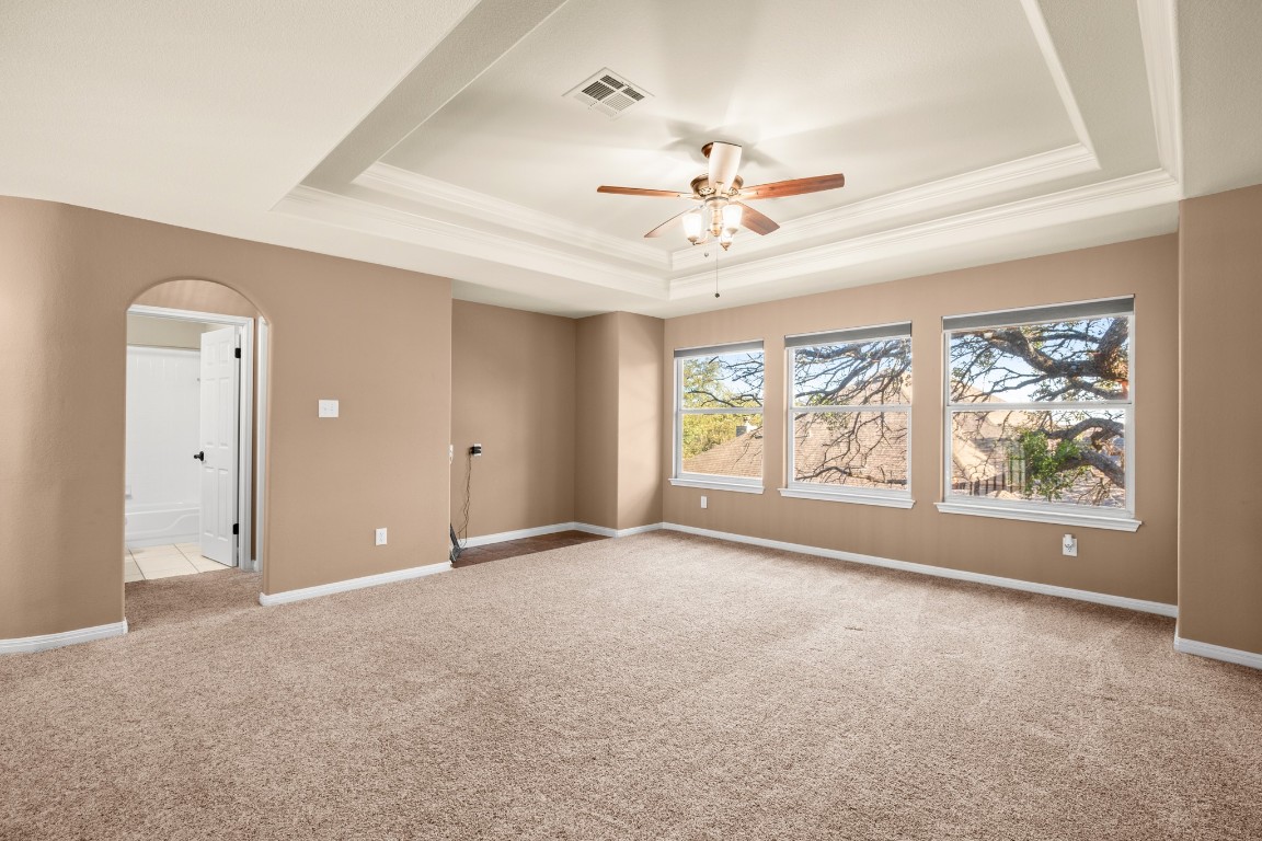 8021 Tahoe Parke Circle Austin, TX 78726 - Photo 22 of 33 a view of an empty room with a window