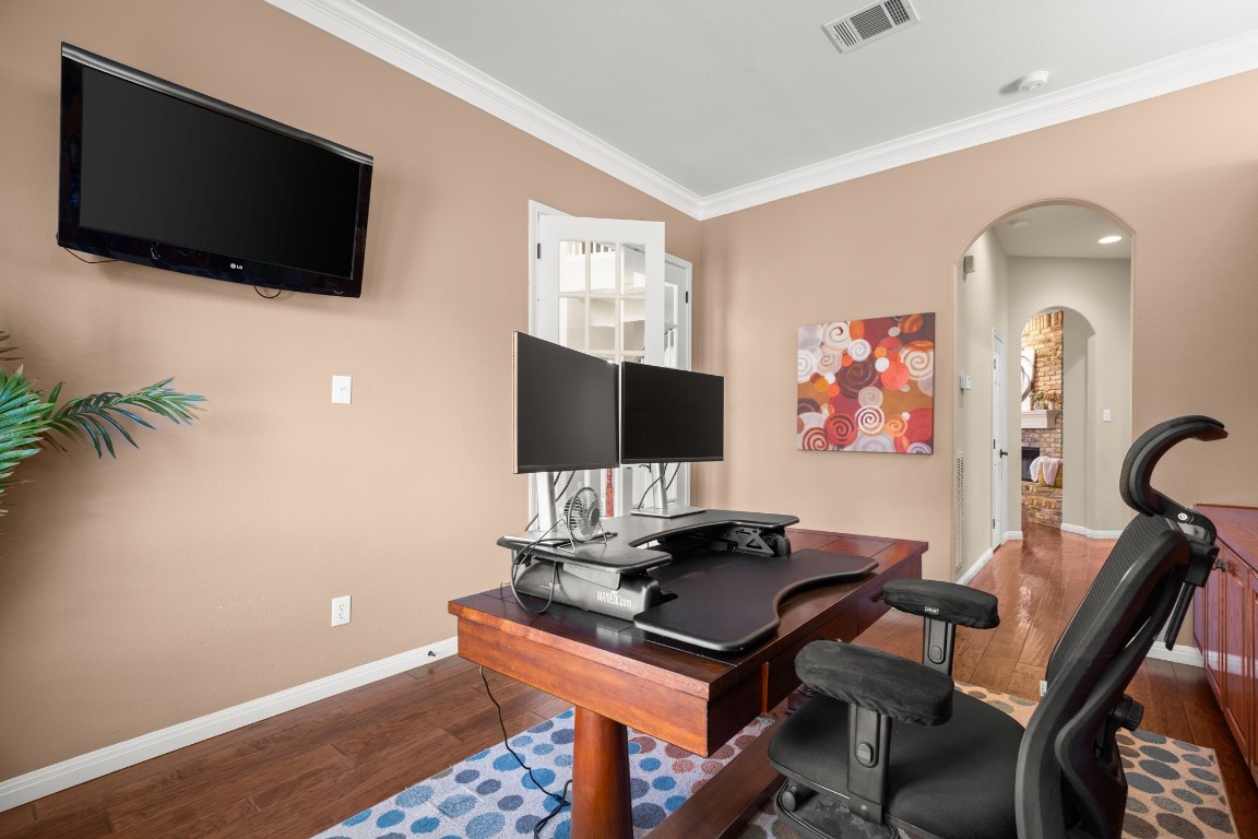 8021 Tahoe Parke Circle Austin, TX 78726 - Photo 5 of 33 a living room with furniture and a flat screen tv