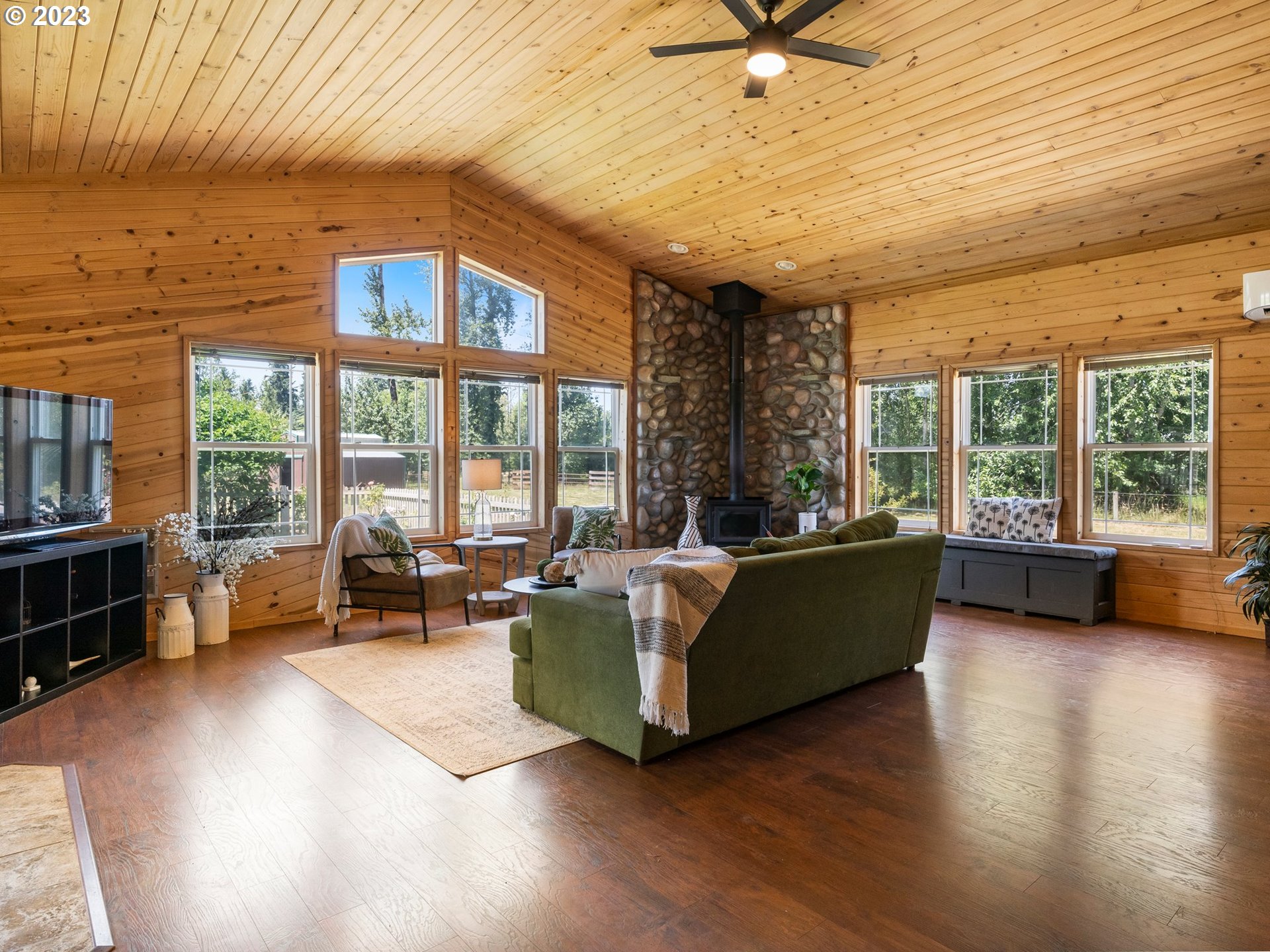 22114 Northeast 29th Avenue Ridgefield, WA 98642 - Photo 14 of 46 a living room with furniture and large windows