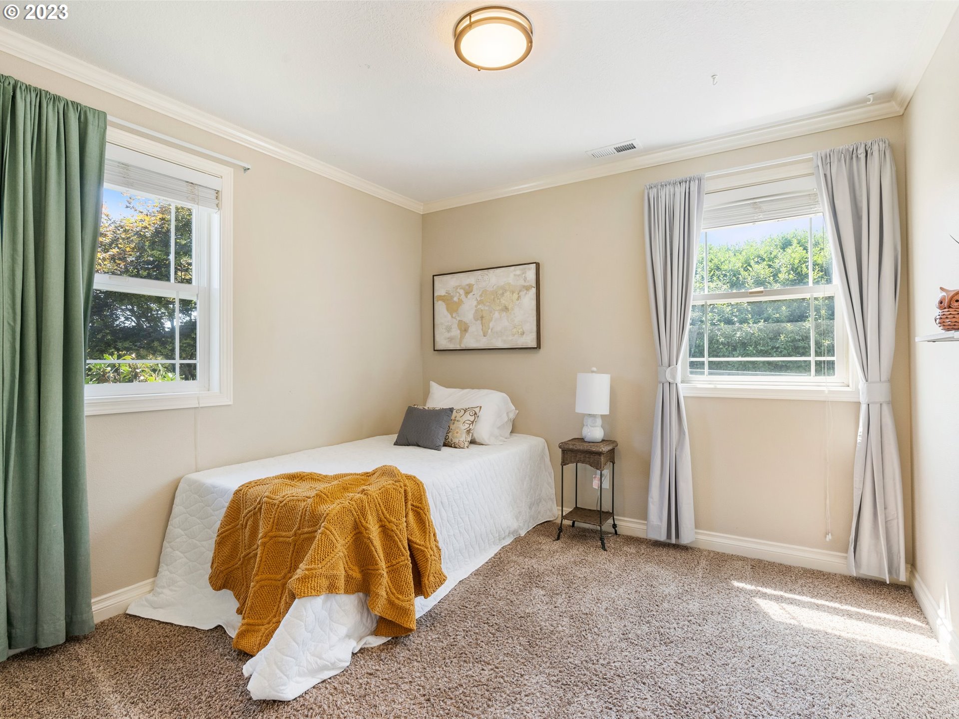 22114 Northeast 29th Avenue Ridgefield, WA 98642 - Photo 25 of 46 a spacious bedroom with a bed and a window