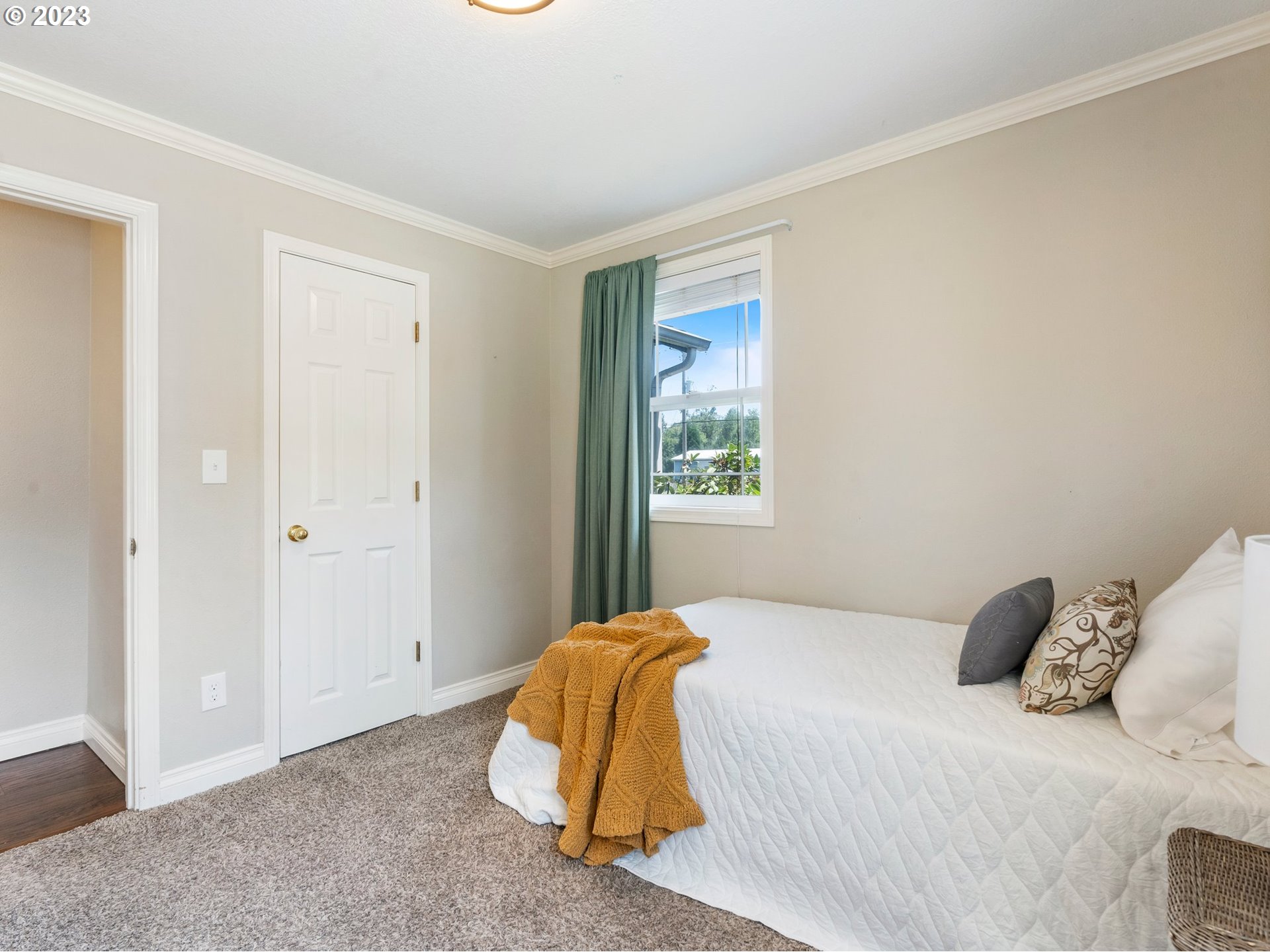 22114 Northeast 29th Avenue Ridgefield, WA 98642 - Photo 26 of 46 a bedroom with a bed and a window