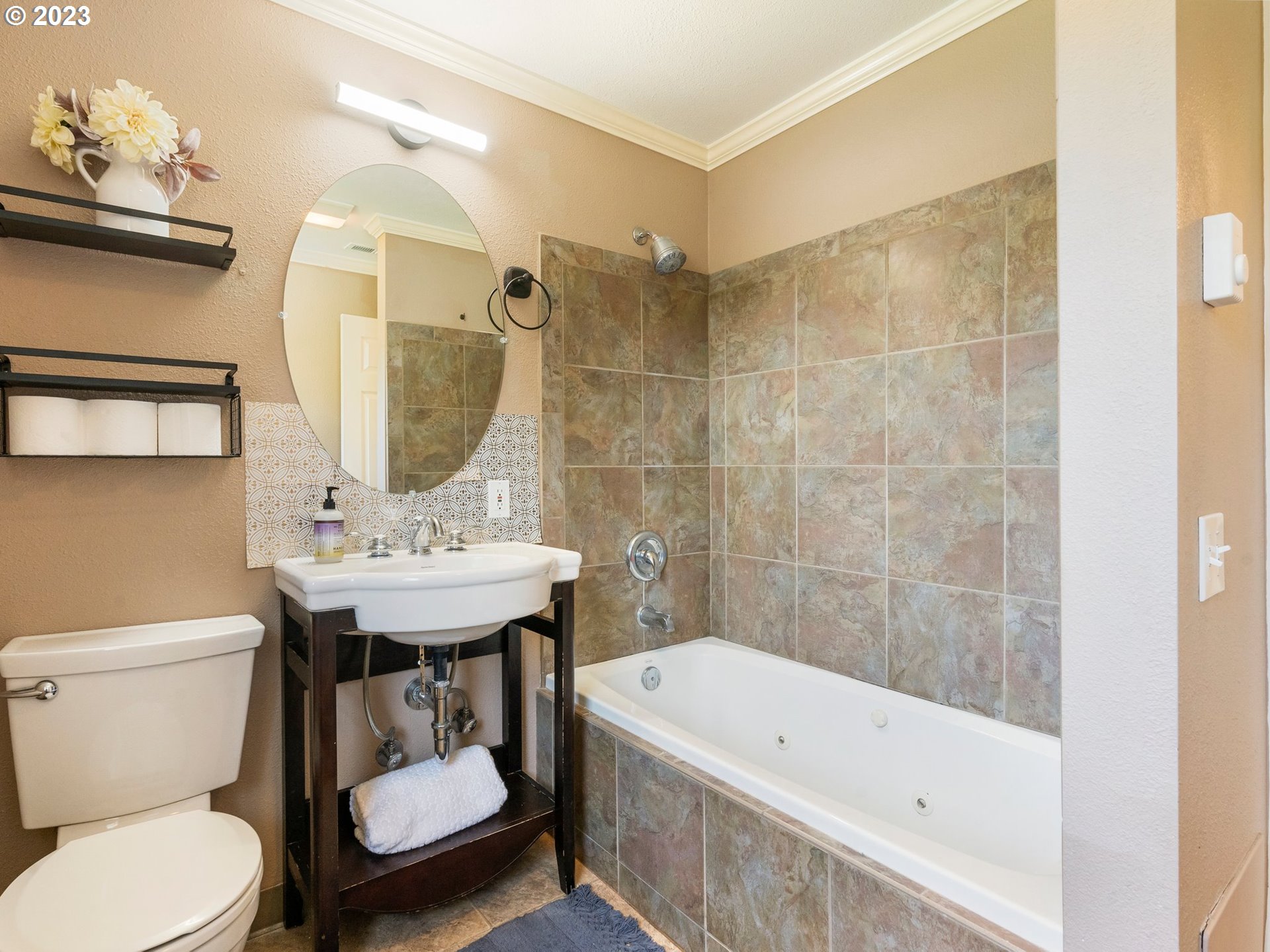 22114 Northeast 29th Avenue Ridgefield, WA 98642 - Photo 30 of 46 a bathroom with a sink a toilet and bathtub