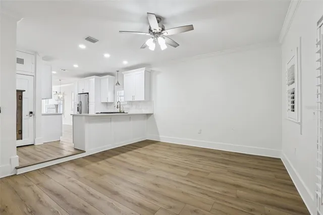 a view of kitchen with wooden floor