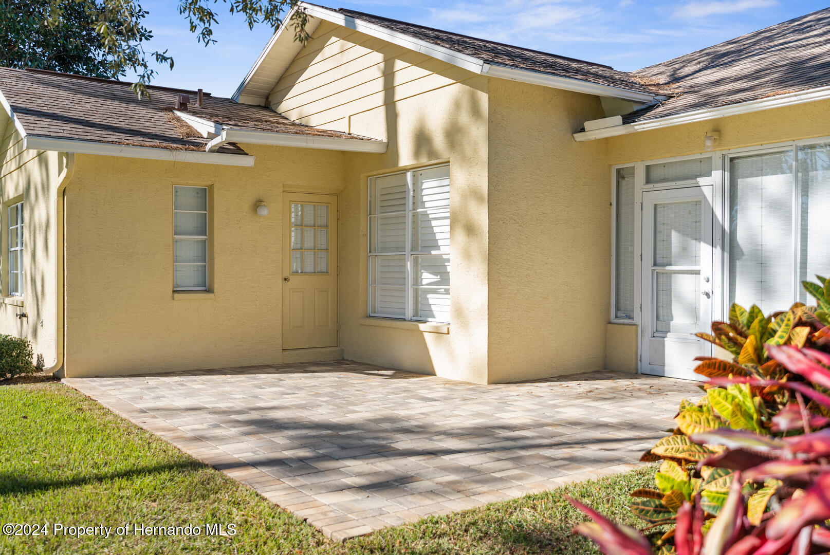 7424 Harvard Hills Place Spring Hill, FL 34606 - Photo 35 of 38 a front view of a house