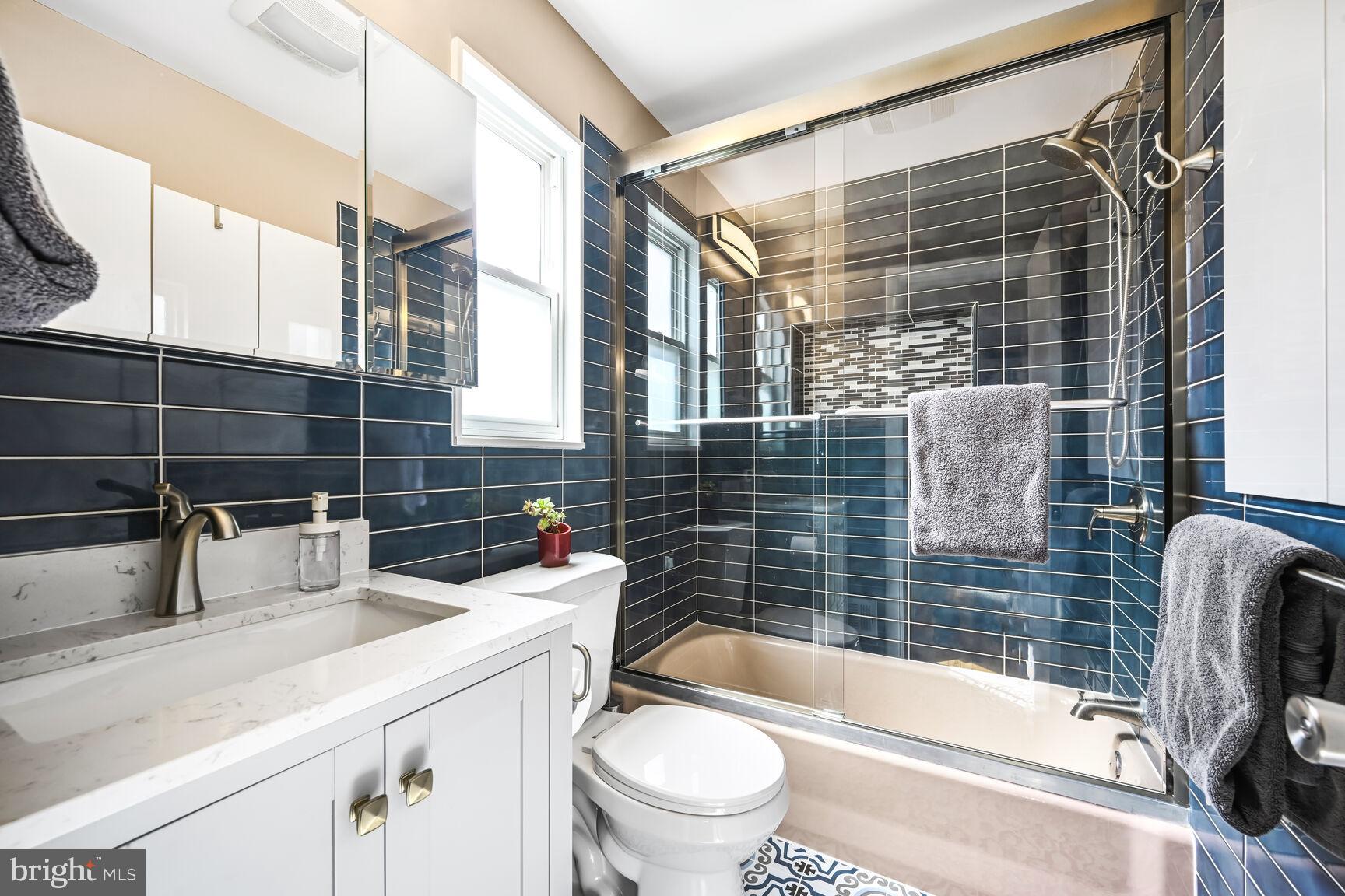 2308 Peggy Lane Silver Spring, MD 20910 - Photo 18 of 27 a bathroom with a sink a toilet and shower