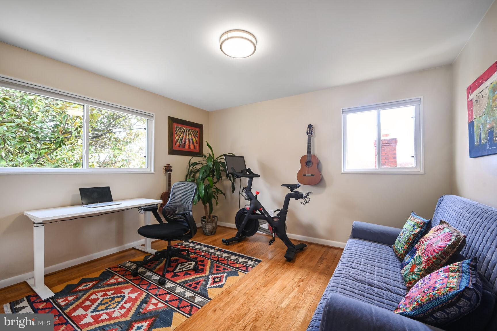 2308 Peggy Lane Silver Spring, MD 20910 - Photo 20 of 27 a living room with furniture a rug and a window