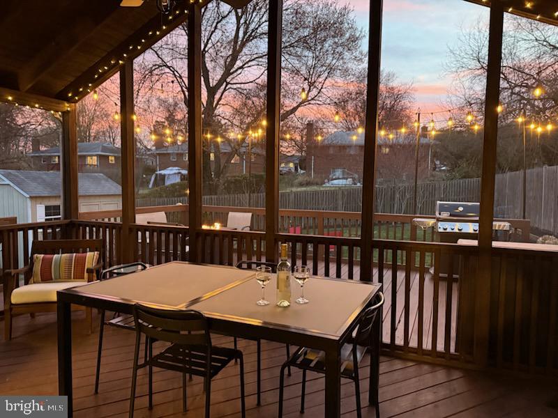 2308 Peggy Lane Silver Spring, MD 20910 - Photo 25 of 27 a view of a balcony with a table and chairs