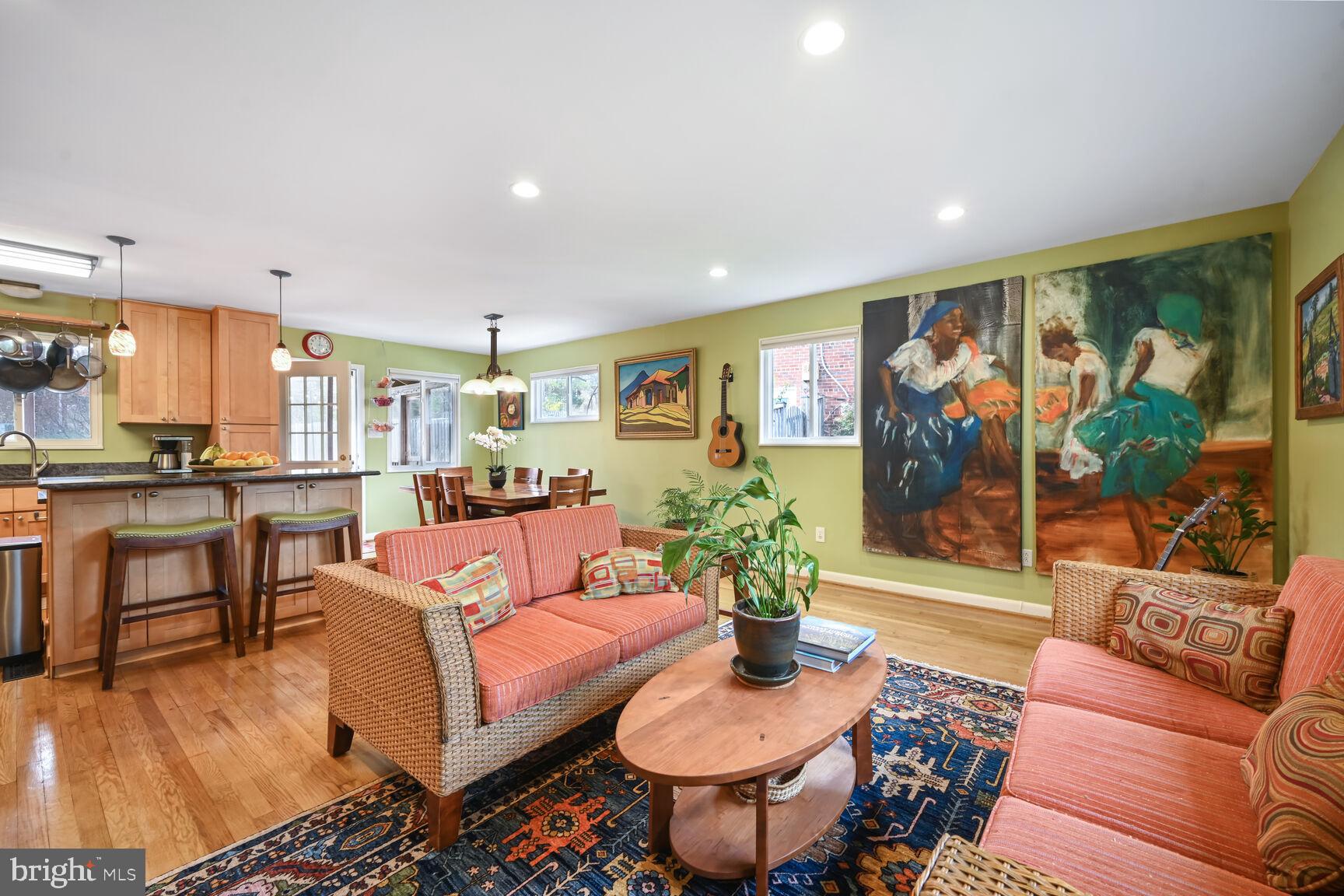 2308 Peggy Lane Silver Spring, MD 20910 - Photo 6 of 27 a living room with furniture potted plant and kitchen view