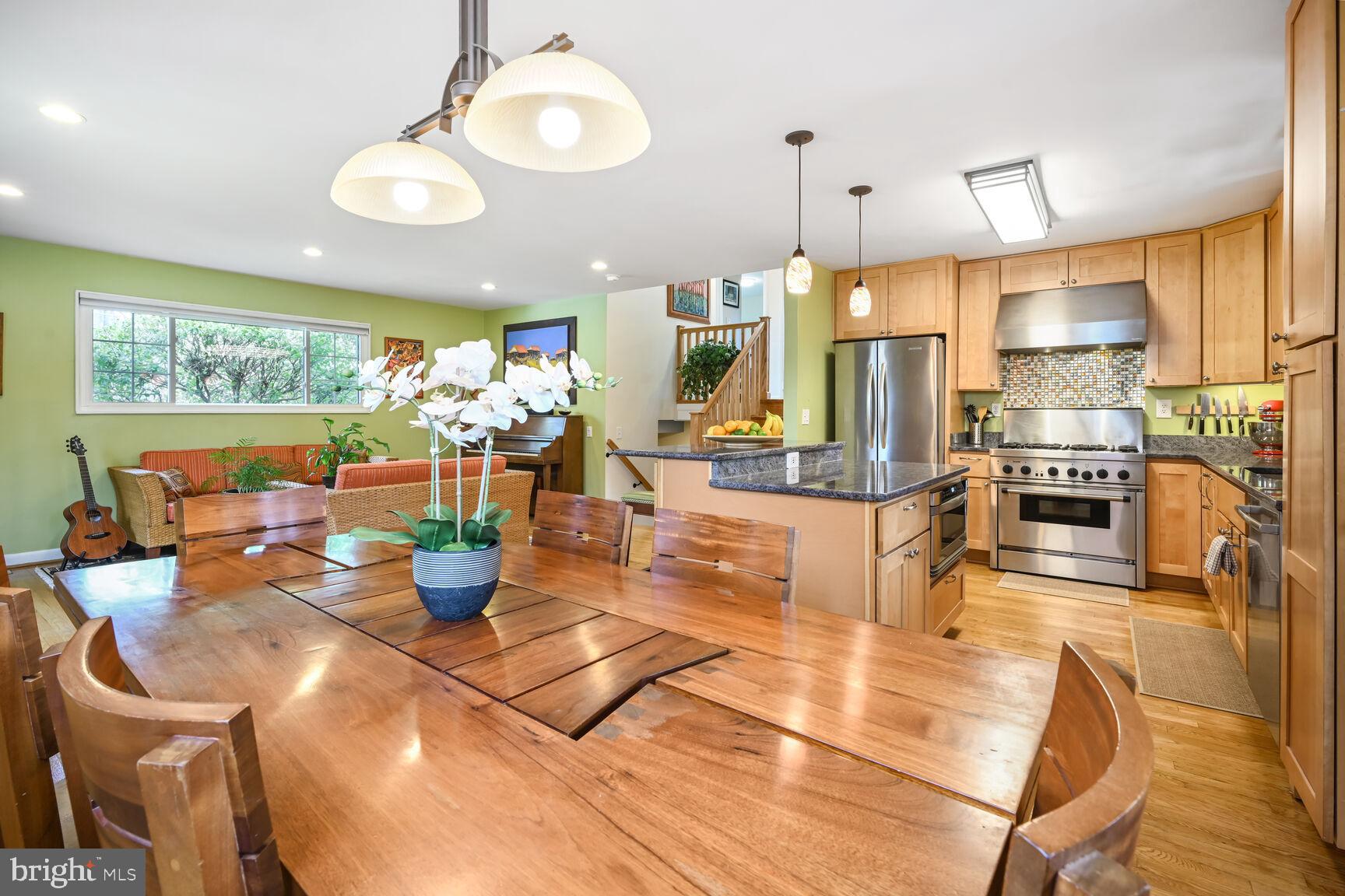 2308 Peggy Lane Silver Spring, MD 20910 - Photo 9 of 27 a view of a dining hall with couches and chandelier
