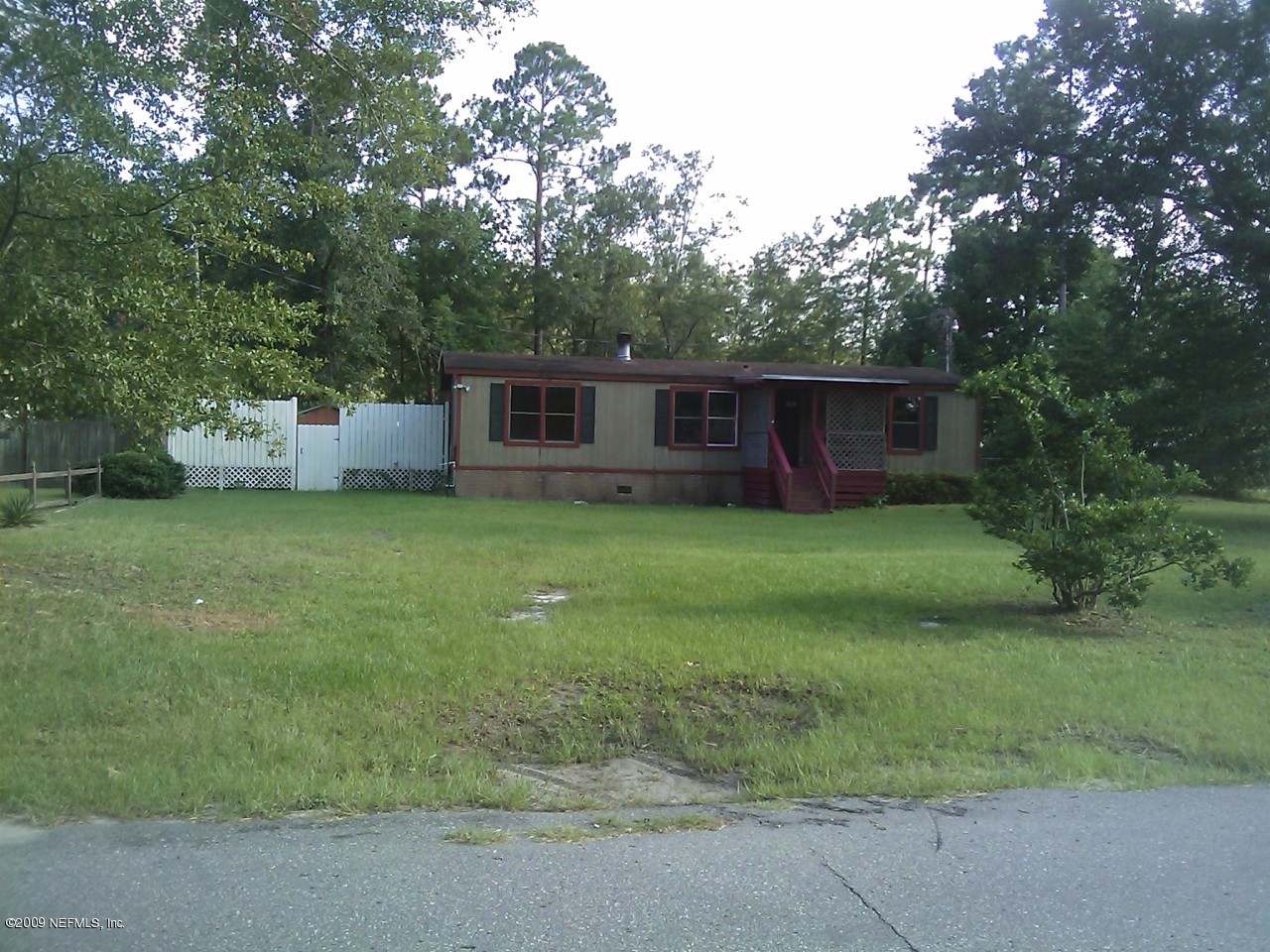8676 Hilma Road Jacksonville, FL 32244 - Photo 1 of 6 Front of Home