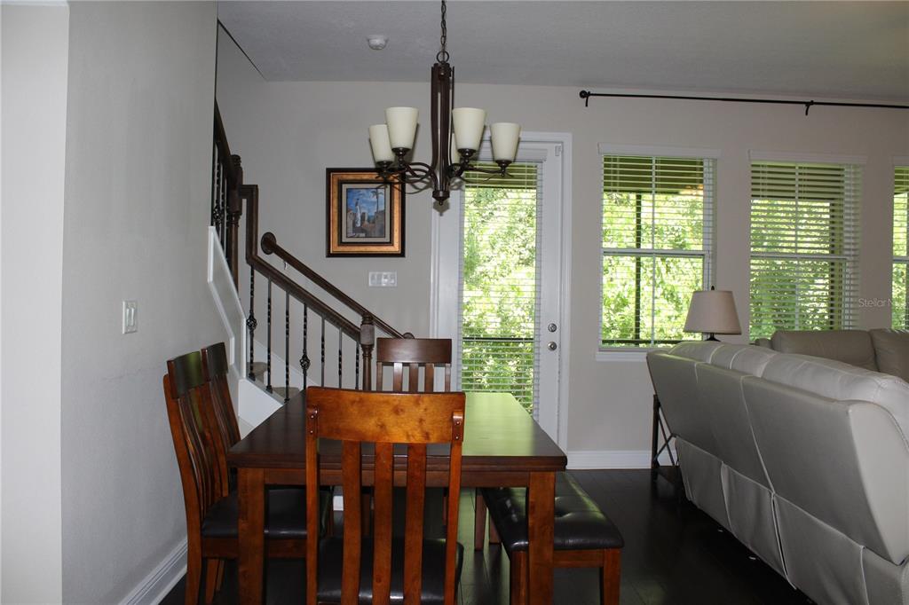 131 Villa Preserve Avenue Tampa, FL 33613 - Photo 14 of 28 a view of a dining room with furniture window and outside view