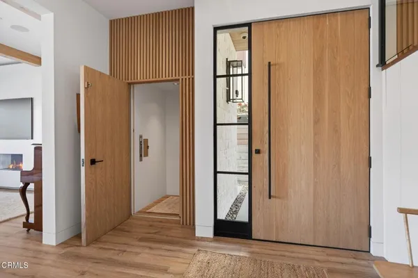a room with a sink and a mirror