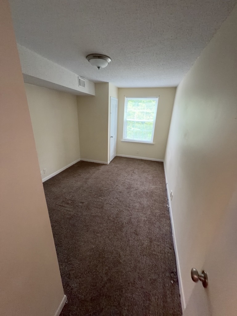 441 Harding Place, Unit A14 Nashville, TN 37211 - Photo 7 of 8 an empty room with windows
