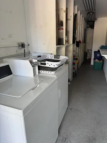 a kitchen that has a sink and a stove