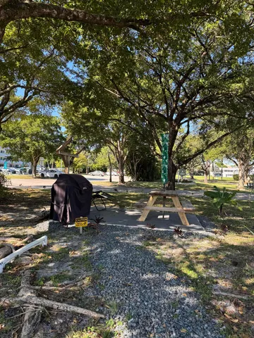 a view of backyard with green space