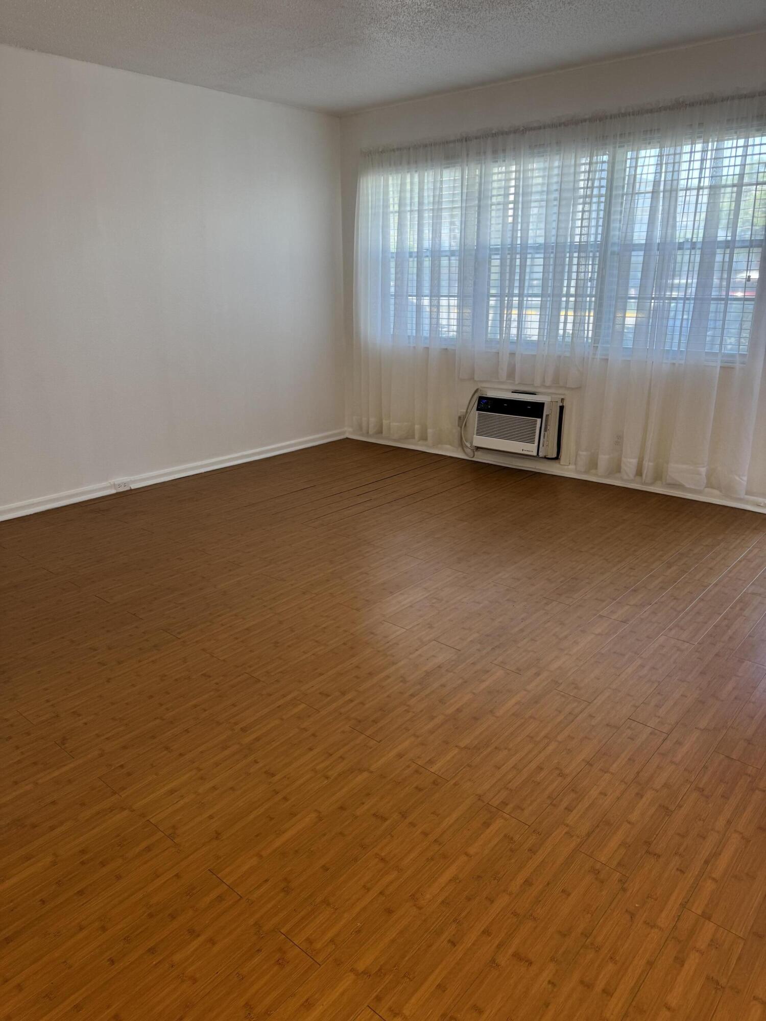 6 Keswick A, Unit 6 Deerfield Beach, FL 33442 - Photo 2 of 17 a view of room and window