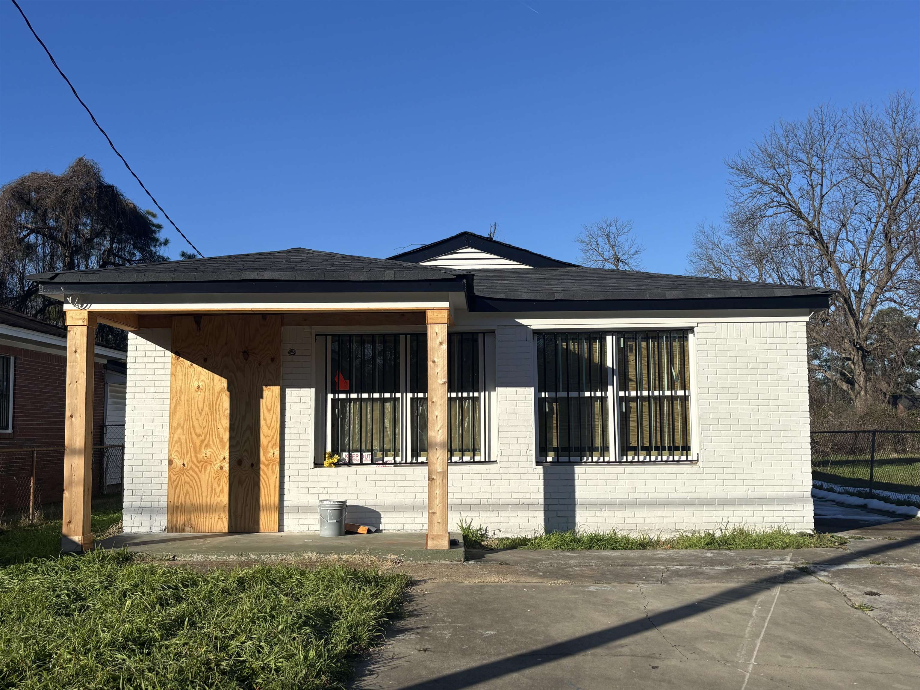 1489 Boxwood Street Memphis, TN 38108 - Photo 1 of 12 a front view of a house with a outdoor space