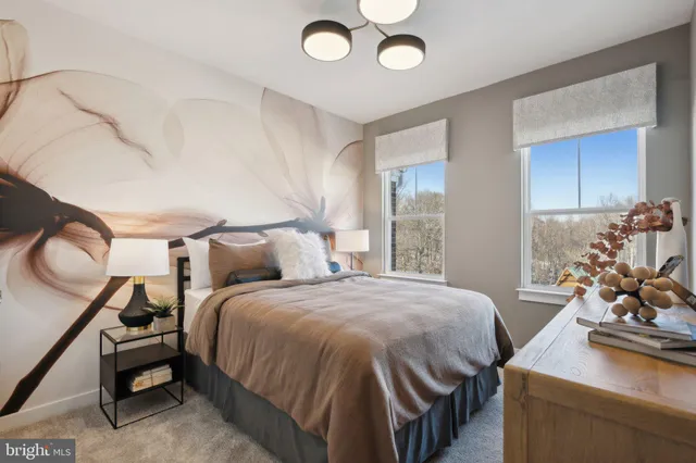 a bedroom with bed and window