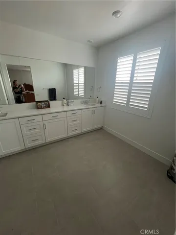 a living room with furniture and window