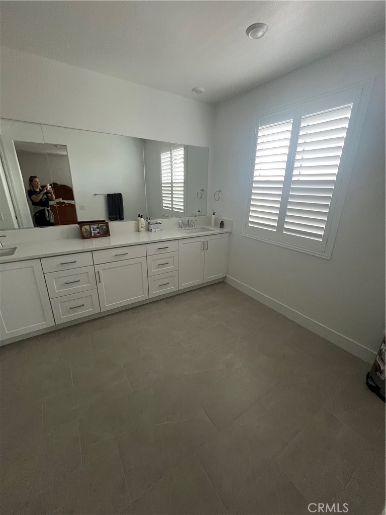 524 Gadwall Irvine, CA 92618 - Photo 19 of 24 a living room with furniture and window