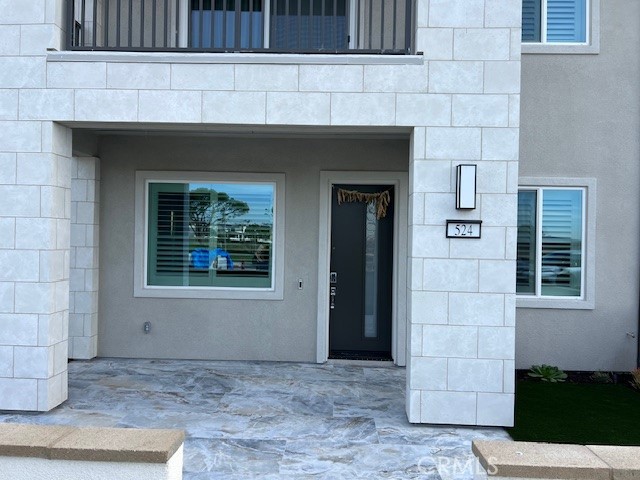 524 Gadwall Irvine, CA 92618 - Photo 2 of 24 a front view of a house with a yard