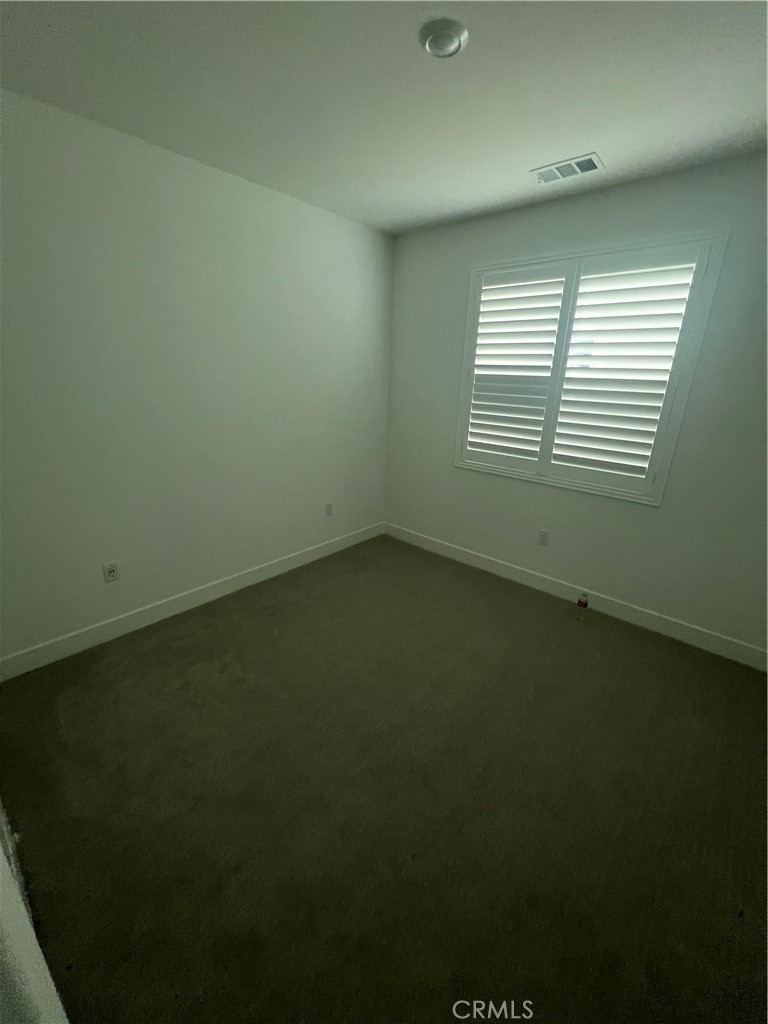 524 Gadwall Irvine, CA 92618 - Photo 23 of 24 an empty room with a window