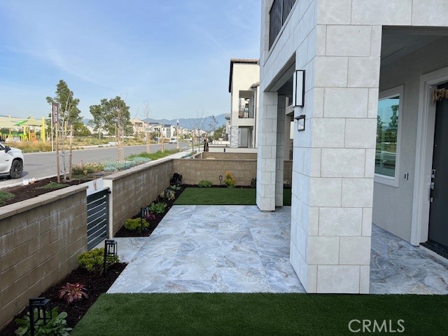 524 Gadwall Irvine, CA 92618 - Photo 3 of 24 a view of a terrace with wooden floor and cabinet