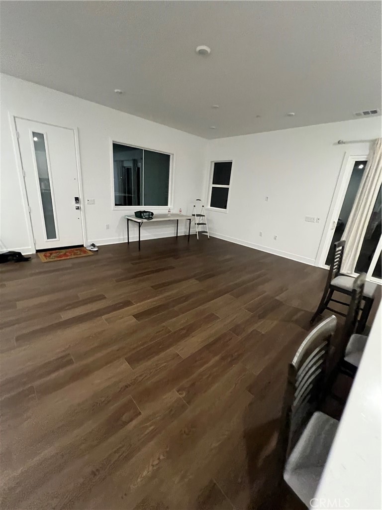 524 Gadwall Irvine, CA 92618 - Photo 7 of 24 a view of room with wooden floor