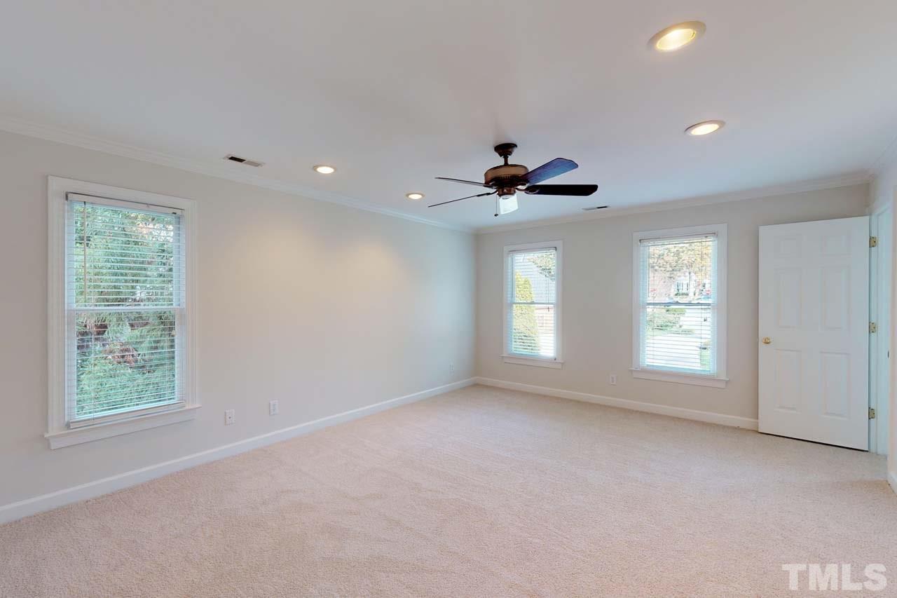 8601 Stanton Place Raleigh, NC 27615 - Photo 13 of 25 This large master suite is complete with his and hers closets and a spacious bathroom featuring double vanity and separate tub and shower.