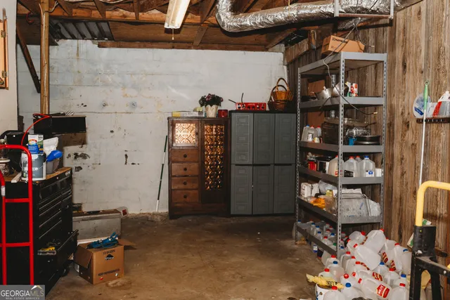 an outdoor space with swimming pool and furniture