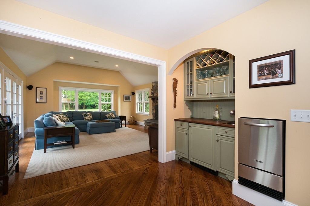 60 Powder Point Avenue Duxbury, MA 02332 - Photo 11 of 30 a living room with furniture and a large window