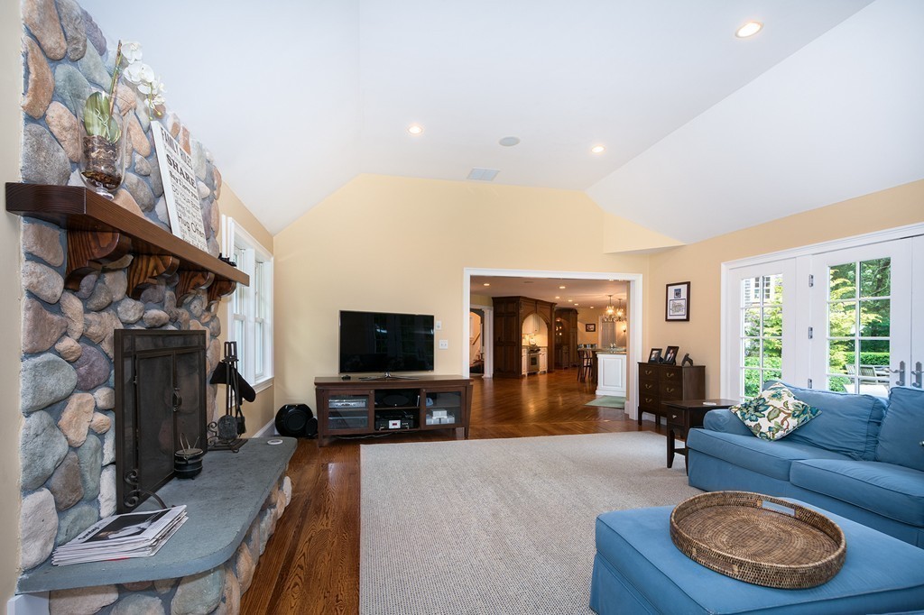 60 Powder Point Avenue Duxbury, MA 02332 - Photo 12 of 30 a living room with furniture and a flat screen tv