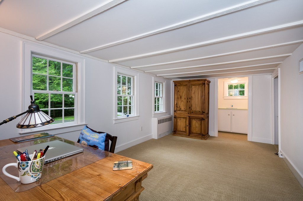 60 Powder Point Avenue Duxbury, MA 02332 - Photo 14 of 30 a living room with furniture and a window