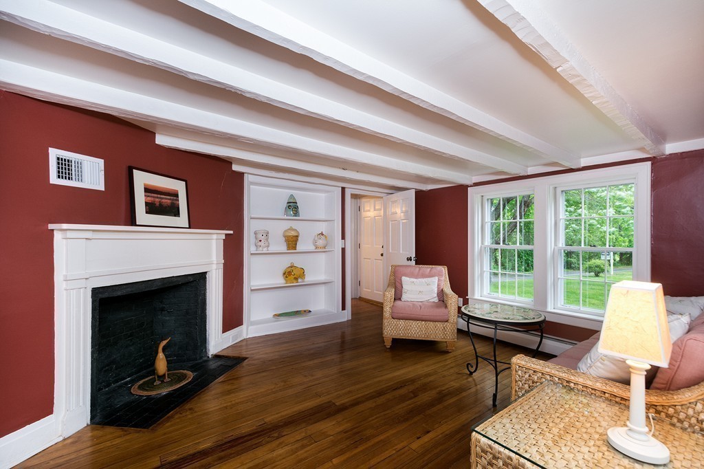 60 Powder Point Avenue Duxbury, MA 02332 - Photo 15 of 30 a living room with furniture a window and a fireplace