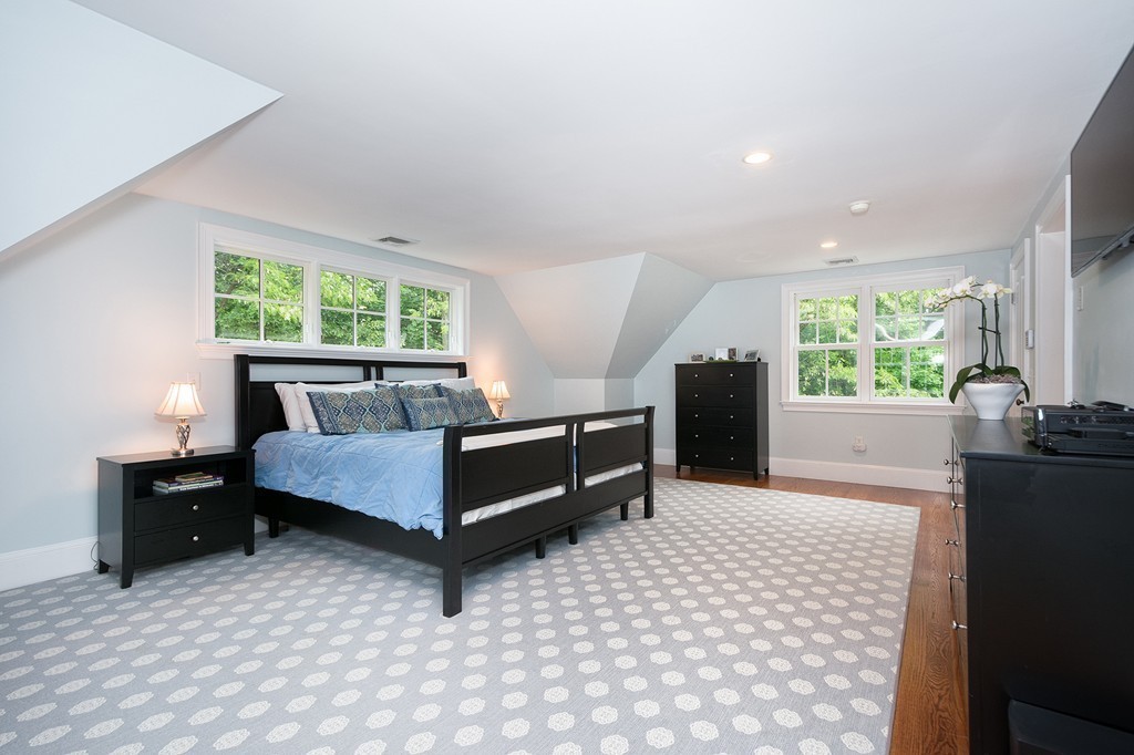 60 Powder Point Avenue Duxbury, MA 02332 - Photo 18 of 30 a bedroom with a bed and window